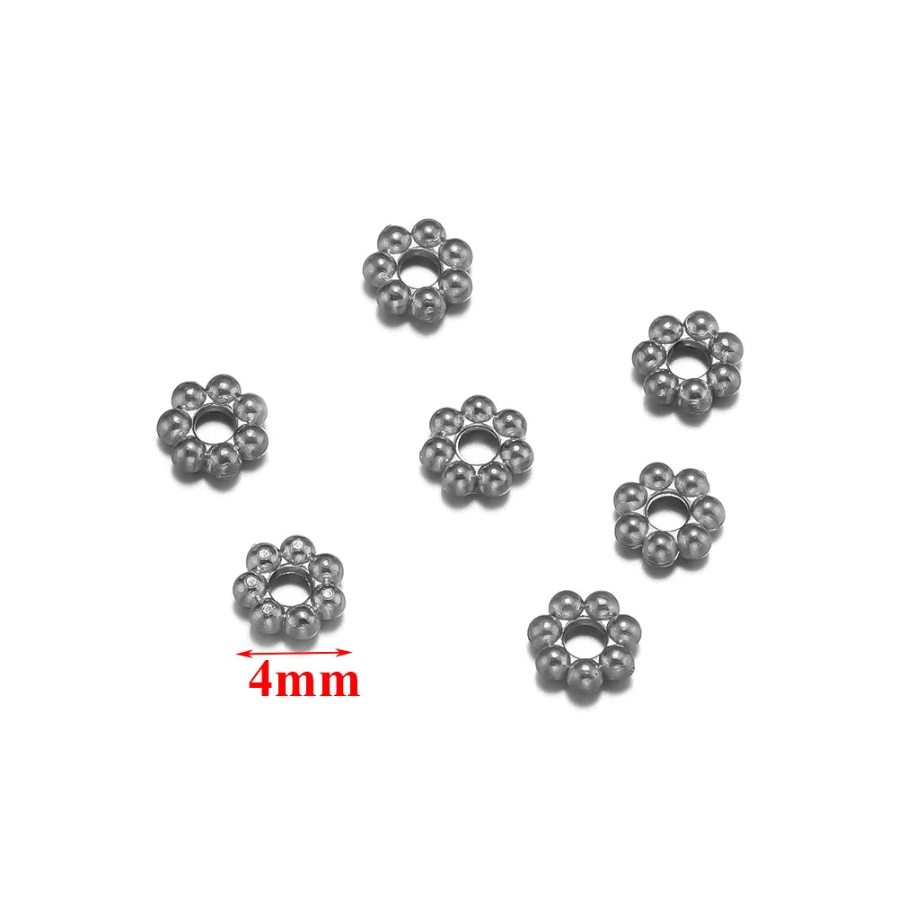 PERLINE DISTANZIATRICI A FORMA DI FIORE IN ACCIAIO