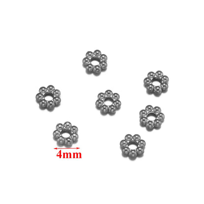 PERLINE DISTANZIATRICI A FORMA DI FIORE IN ACCIAIO