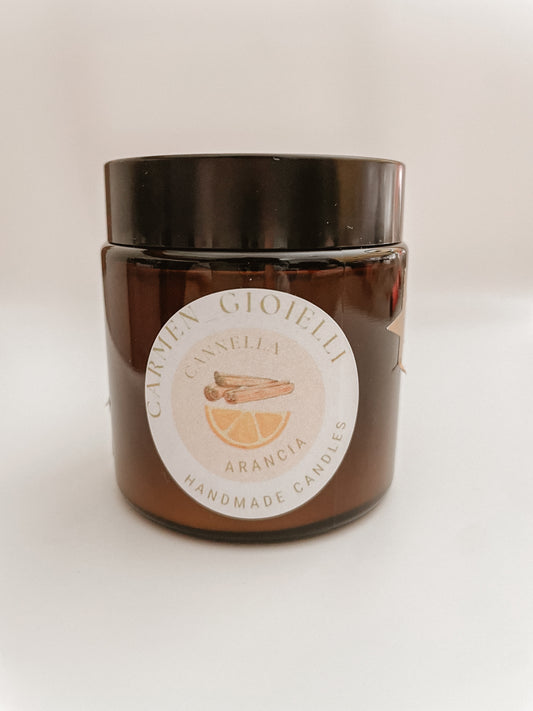 CANDELA DI SOIA ARANCIA E CANNELLA CON GIOIELLO DENTRO