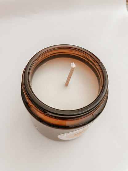 CANDELA DI SOIA ARANCIA E CANNELLA CON GIOIELLO DENTRO